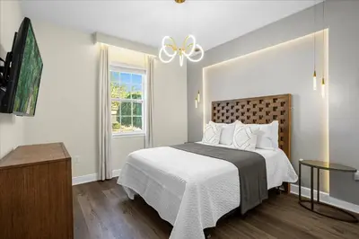 a bedroom with a bed and a window at Awsome 8 Bd 6.5 Ba Sleeps 20 Encore in Orlando