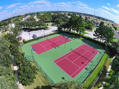 an overhead view of two tennis courts on a park at Windsor Palms Escape w/ Splash Pool in Kissimmee
