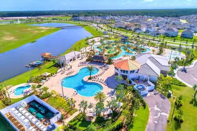an aerial view of a resort with a pool at Lovely Themed Room with Private Pool in Kissimmee