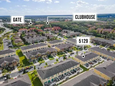 an aerial view of a city with buildings at Compass Bay: 4Q reformados Perto da Disney! in Kissimmee