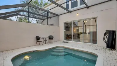 a swimming pool in the backyard of a house at SPD2326 in Kissimmee