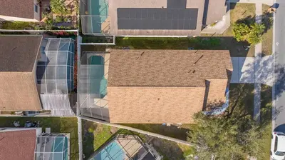 an overhead view of a roof of a house at Near Disney with Pool and BBQ 4BD Single House in Kissimmee