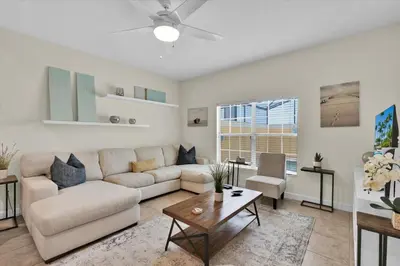 a living room with a couch and a table at CAP8859 in Kissimmee