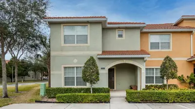 a house with a driveway in front of it at CAP8949 in Kissimmee