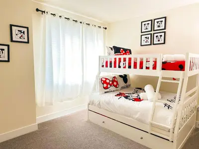 a white childs bedroom with a white bunk bed at TR1386PNW - 9 guests - pool home close to Disney in Clermont