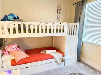 a white bunk bed in a childs bedroom at TR1388PNW - Modern New Home 4 Bed in Clermont