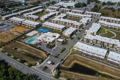 an aerial view of a city with buildings at 7458 Magic Village - 8 hóspedes, jacuzzi, 8 minutos da Disney in Orlando