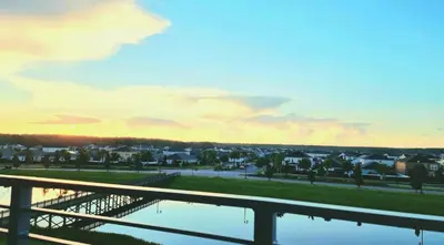 a view of a city from a bridge over a body of water at Stunning Storey Lake Resort and Game room in Kissimmee
