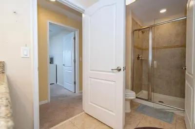 a bathroom with a shower and a toilet at Nice Vacation Townhouse w Pool SL4893 in Kissimmee