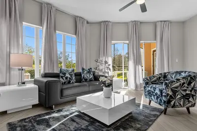 a living room with a couch and a table at Unit 5203 Worldquest in Orlando