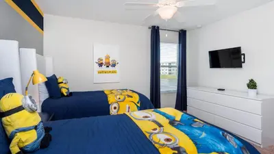 a bedroom with two beds and a tv at KCC4741 in Kissimmee