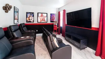 a living room with leather furniture and a flat screen tv at NRL4543 in Kissimmee