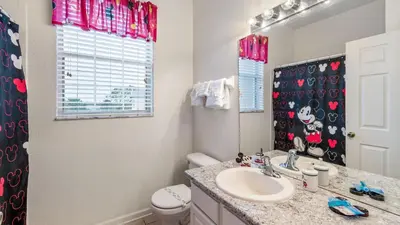 a bathroom with a sink and a toilet at Windsor Hills Resort 3 Bedroom 4th Floor Condo with Resort Access 0946 in Orlando