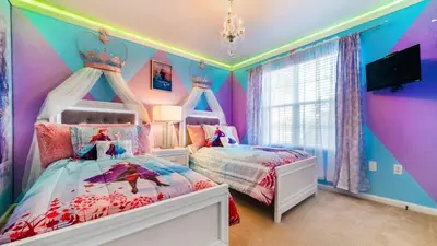 a childs bedroom with two beds and a princess ceiling at Windsor Hills Resort 6 Bedroom Home Incredible Game Room 0852 in Orlando