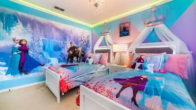 a bedroom with two beds in a frozen room at Windsor Hills Resort 6 Bedroom Home Incredible Game Room 0852 in Orlando