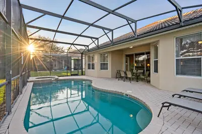 a swimming pool with a glass roof on a house at Windsor Hills Resort 5 Bedroom Private Pool Home 0869 in Orlando