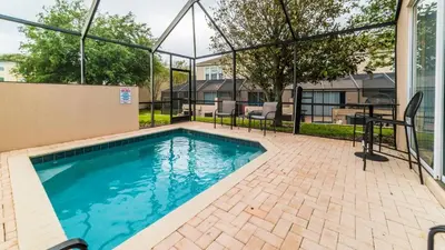 a swimming pool in the middle of a building at Windsor Palms Resort 3 Bedroom Pool Townhome 0868 in Kissimmee