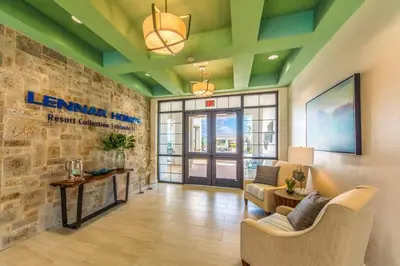 a living room with a couch and a fireplace at casa 4Q com piscina Mickey & Star Wars! in Kissimmee