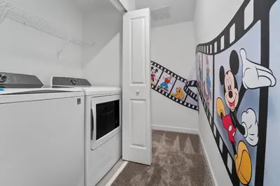a kitchen with a stove and a microwave at Family Mickey & Star Wars - FREE Heated Pool in Kissimmee