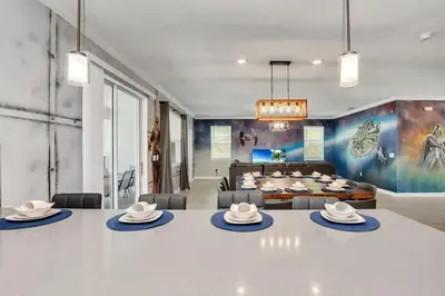 a conference room with a table with hats on it at Brand New Storey Lake 8BR Villa with Lake View in Kissimmee