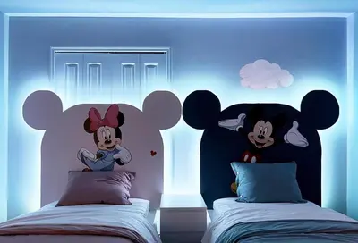 a bedroom with two beds with mickey mouse headboards at 4184PD Weekly Stay 5BR Free Water Park in Kissimmee