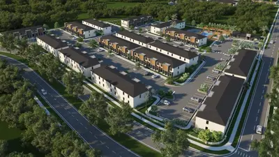 an overhead view of a building with a parking lot at 3251 The Hub escape with flex space in Kissimmee