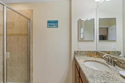 a bathroom with two sinks and a shower at BCH3071 in Kissimmee