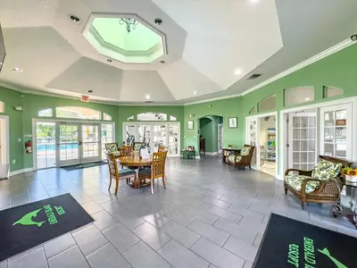 a living room with a table and chairs at CCL8538 in Kissimmee