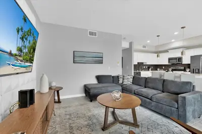 a living room with a couch and a table at PXC3151-306 in Kissimmee