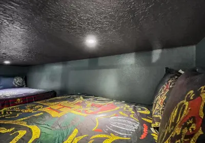 a bed in a room with a bedspread on it at SHD4724 in Kissimmee