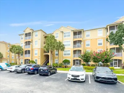 a parking lot in front of a building at ALM2784-404 in Orlando