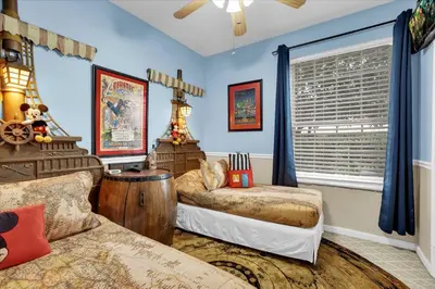 a bedroom with two beds and a window at SPD2302-103 in Kissimmee