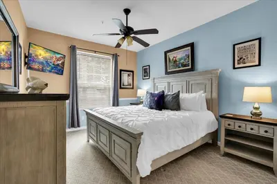 a bedroom with a bed and a ceiling fan at SPD2302-103 in Kissimmee