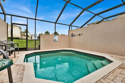 a swimming pool in a house with a roof at SPD2319 in Kissimmee