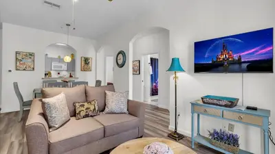 a living room with a couch and a table at BF2302-203 Windsor Palms Resort 3 Bedroom in Kissimmee