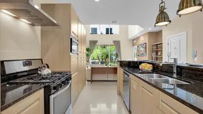 a large kitchen with a sink and a stove at RCF7646 in Orlando
