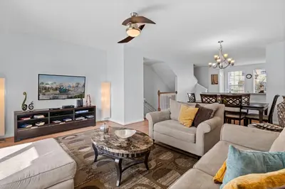 a living room with a couch and a table at Comfortable 3BR Near Convention Center & Epic Park in Orlando