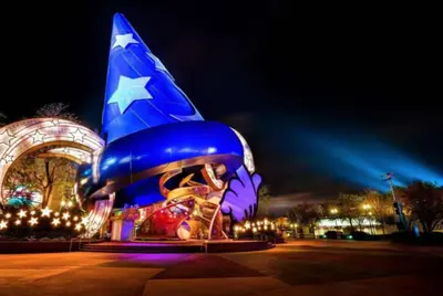 a large inflatable object is lit up at night at NEW King Bed Glow In The Dark Kid Cave in Kissimmee
