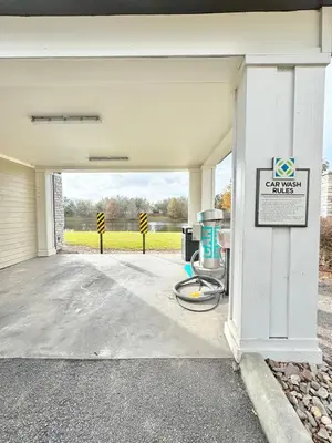 an empty garage with a sign in front of it at Modern Apt in Lake Nona, 10min to ORL Airport in Orlando