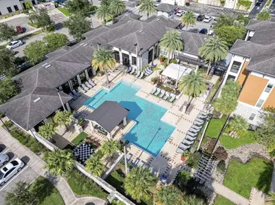 an aerial view of a house with a swimming pool at Modern Apt in Lake Nona, 10min to ORL Airport in Orlando