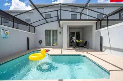a swimming pool with a rubber duck in a house at Stunning 4Bd Close to Disney at Storey Lake Resort 2569 in Kissimmee
