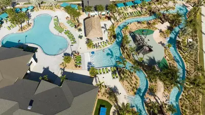 an aerial view of a pool at a resort at Stunning 4Bd Close to Disney at Storey Lake Resort 2569 in Kissimmee
