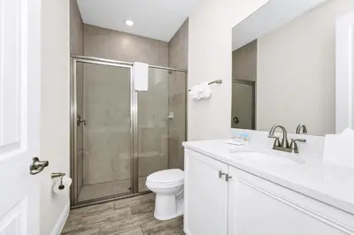 a bathroom with a shower and a toilet and a sink at Tranquil Villa Near Disney With Margaritaville Resort & Island H20 Waterpark Access - 2928Cs in Orlando