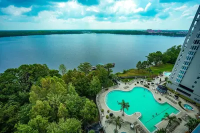 an aerial view of a building and a lake at Orlando 12th Floor - 5 min Disney in Orlando