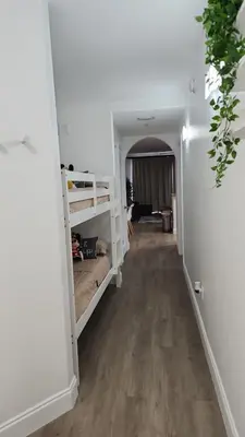 a hallway with bunk beds in a room at Orlando Blue Heron 1 Mile From Disney 2nd floor in Orlando