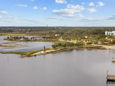 an island in the middle of a large body of water at SUPER BOHO - LAKE TOHO FISHiNG CIVIC CeNTER in Kissimmee