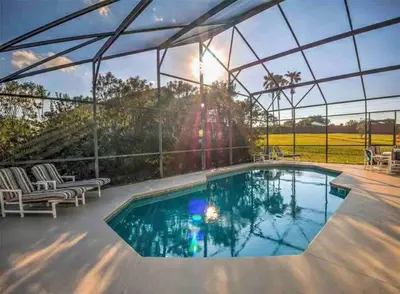 a large swimming pool with a clear cover over it at SUPER GLAM - GAME ROOM and POOL in Orlando