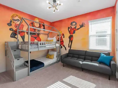 a bedroom with a bunk bed and a mural of superheroes at Super Huge- 12BD 12BAs - Sleeps 38 in Kissimmee