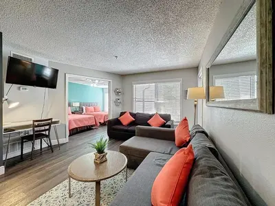 a living room with a couch and a table at Two bed condo in Parkway Palms Resort condo in Orlando