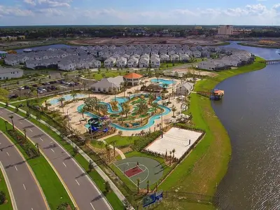 an aerial view of a resort by the water at FLASH SALE Pvt Pool and Spa Home at Storey Lake in Kissimmee